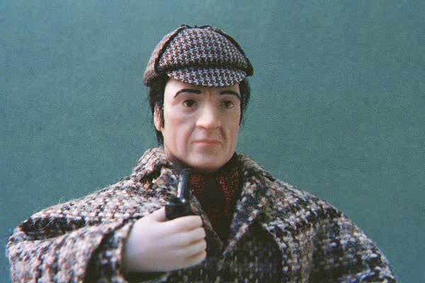 This is a Portrait Doll of Basil Rathbone